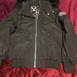 Moose Knuckles black bomber jacket with fur hood