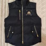 Black and gold moose knuckles vest
