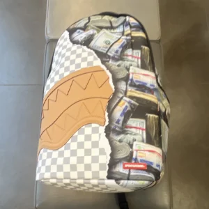 Sprayground Limited Edition Shark Mouth Checkered Money Print Backpack Medium - Image 1